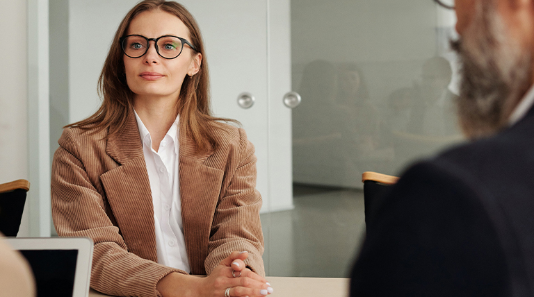 What is the difference between a leader and a manager?